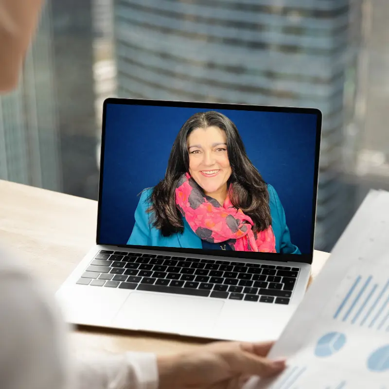 Tracy Heatley on a clients laptop having a Foundation Marketing Strategy session as part of her Marketing Consultant service.